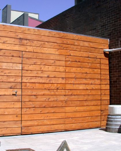 Gowing Don House timber lined rear of side garage