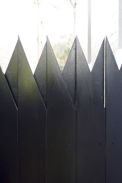 Unfurled House gate detail