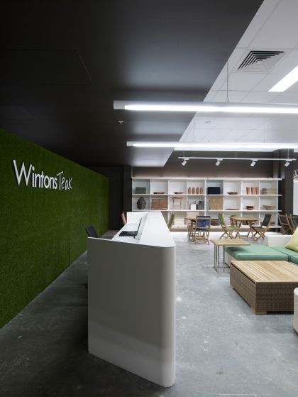 Wintons Teak Showroom sales counter joinery & turf wall detail