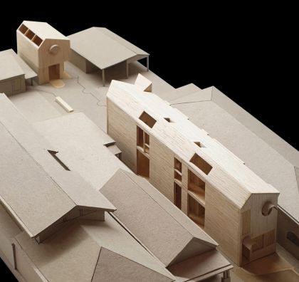 National House model aerial view with rear artist studio