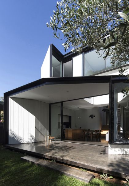 Unfurled House rear exterior oblique view