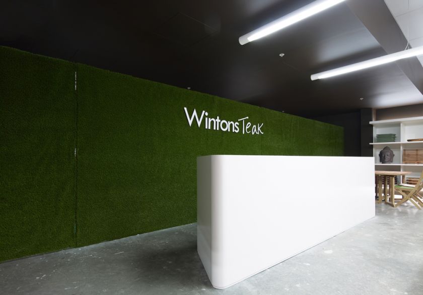Wintons Teak Showroom sales counter joinery & operable turf wall