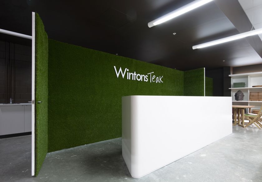 Wintons Teak Showroom sales counter joinery & operable turf wall